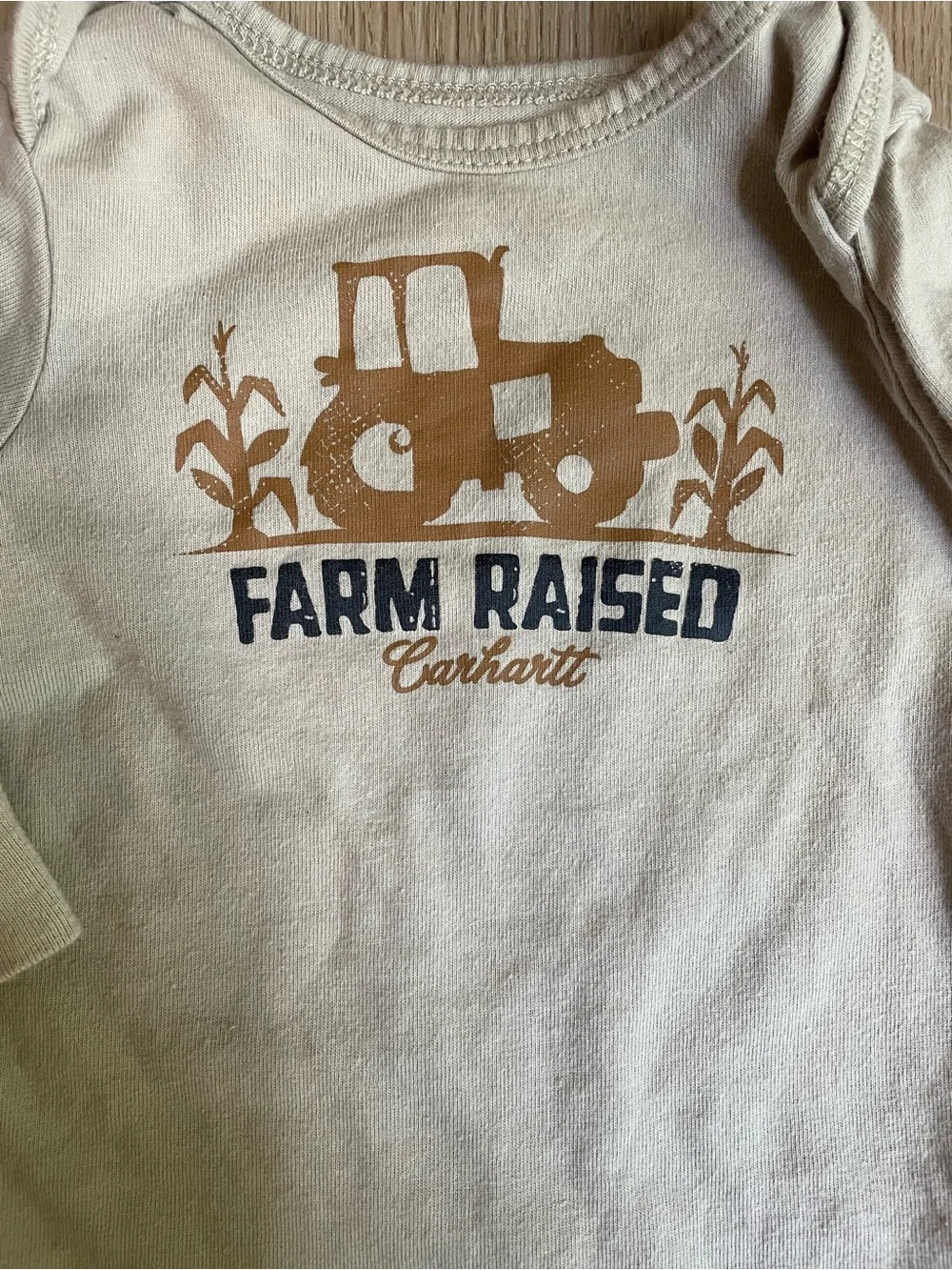 Carhartt Cream Baby Long Sleeve Onesie with Yellow Logo